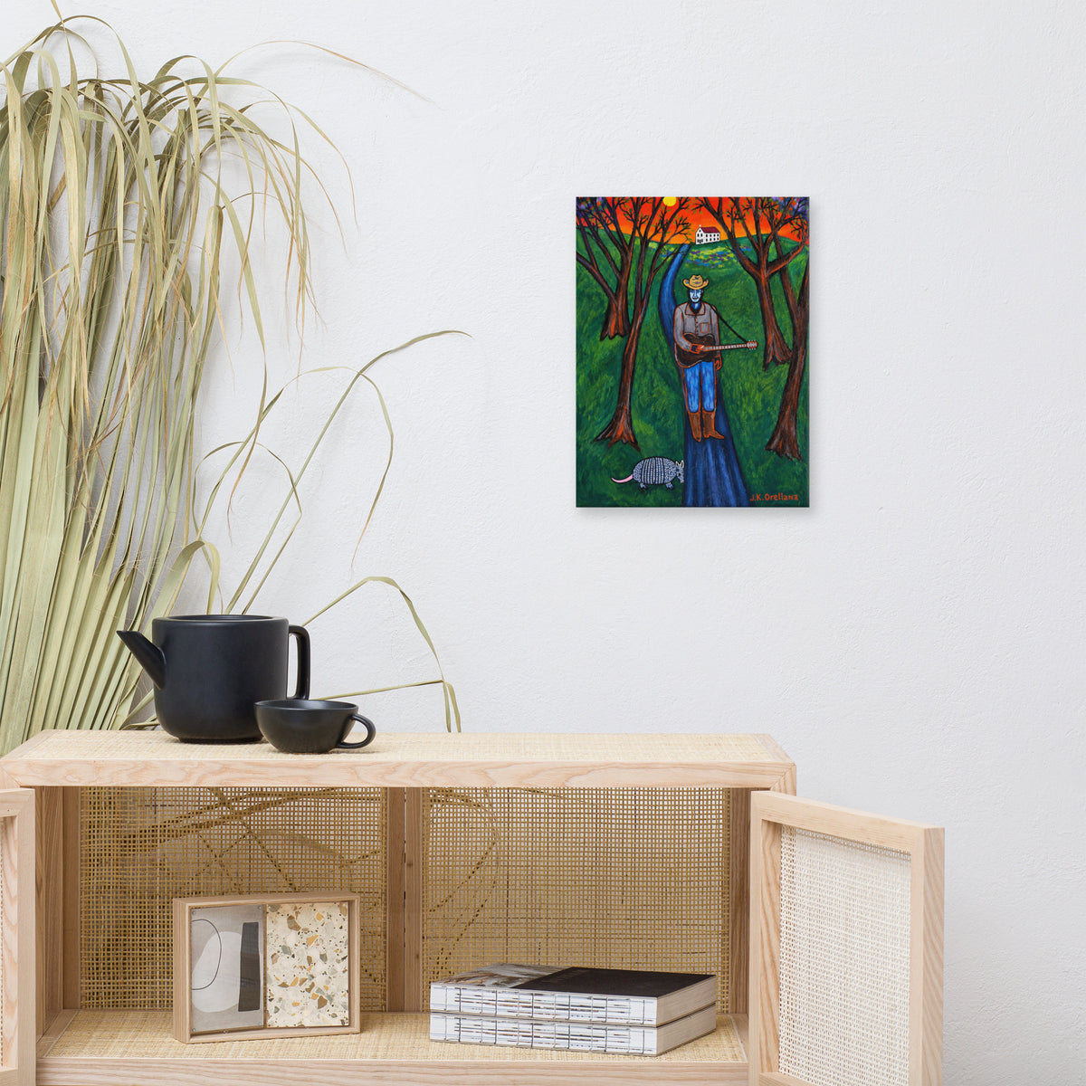 Last Concert, Townes Van Zandt canvas print, shown front-on: Townes Van Zandt in a cowboy hat with a red guitar under a red sunset sky.